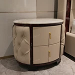 Round Cream Tufted Leather Nightstand with White Marble Top and Dark Glossy Frame